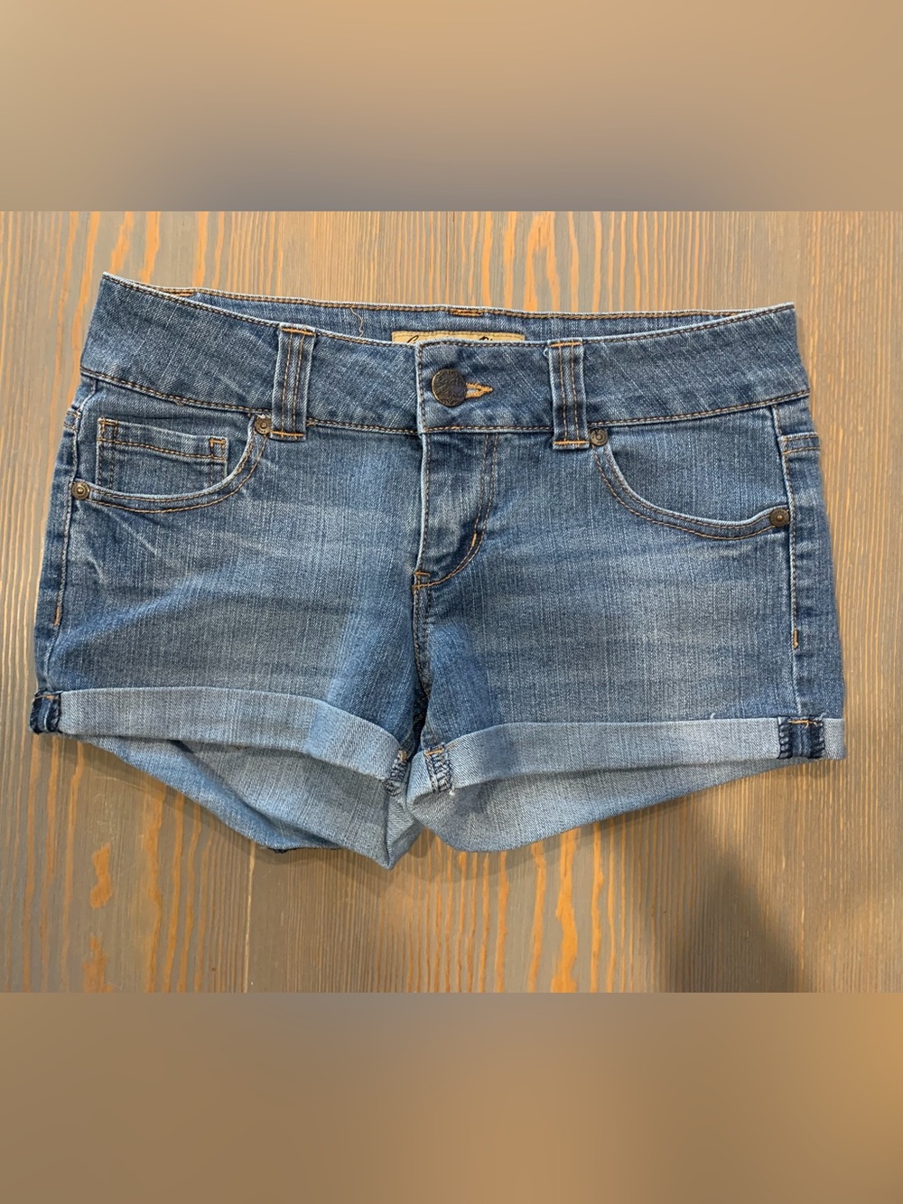 Women’s Celebrity Pink Medium Wash Rolled Hem Denim Shorts